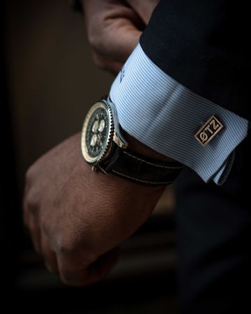 Cropped image of man wearing suit and watch