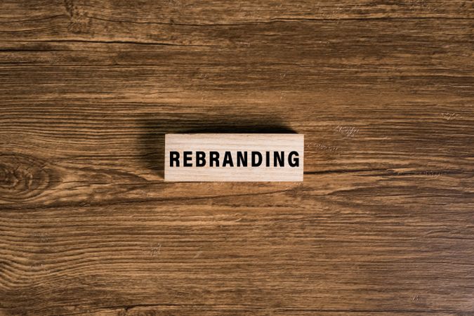rebranding word text on wooden blocks on wooden background