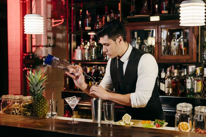 Barman working making drinks