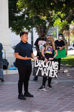 Los Angeles, CA, USA — June 16th, 2020: person speaking to group at rally for solidarity