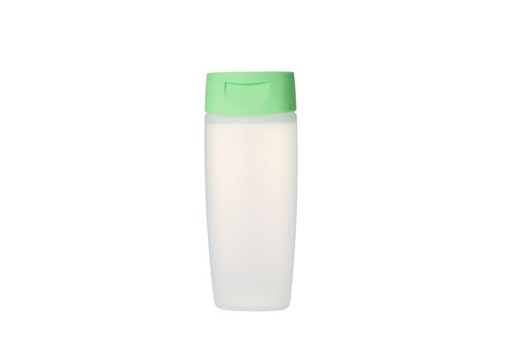 Face tonic in plastic bottle isolated on blank background