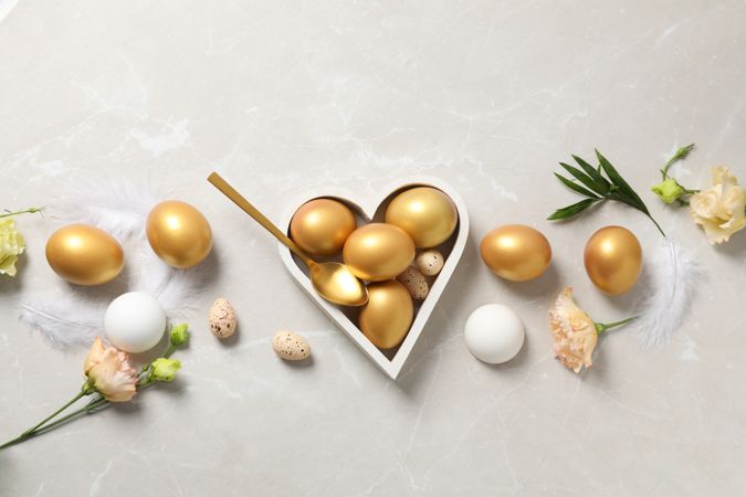 Concept of Richness, golden eggs, top view