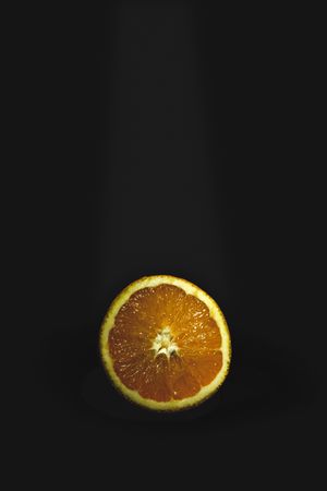 Fresh Oranges on dark background