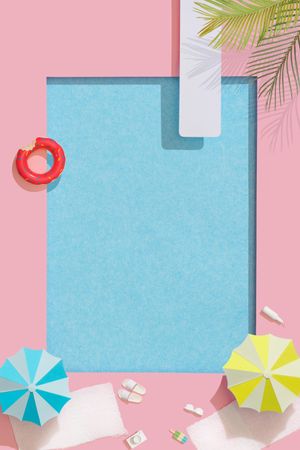 Paper swimming pool with diving board, palm tree, donut, parasols and towels