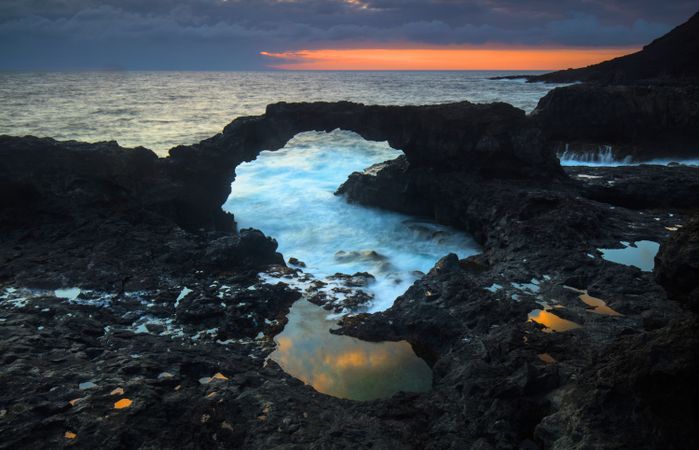 Amazing stone shore and cloudy sky