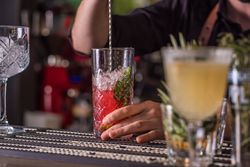 Bartender stirring a cocktail