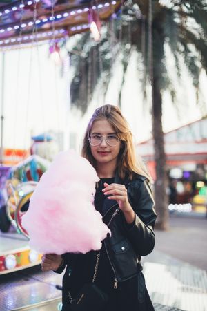 Young woman with cotton candy
