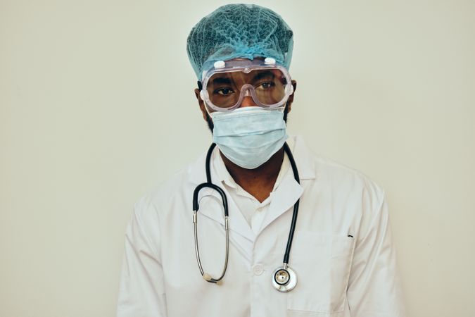 Male surgeon wearing protection for pandemic