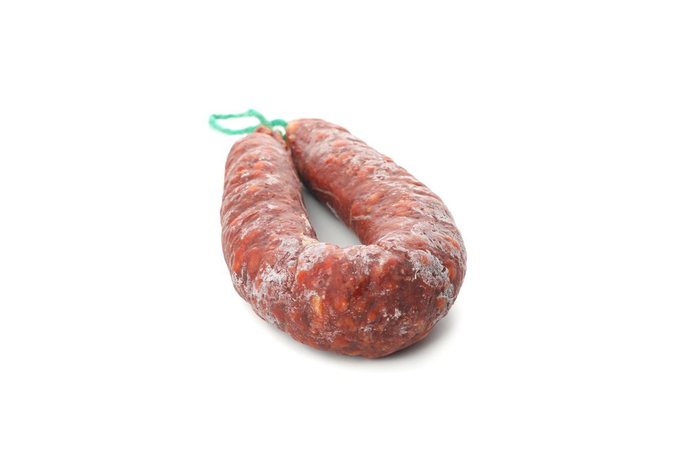 Cured chorizo on blank background