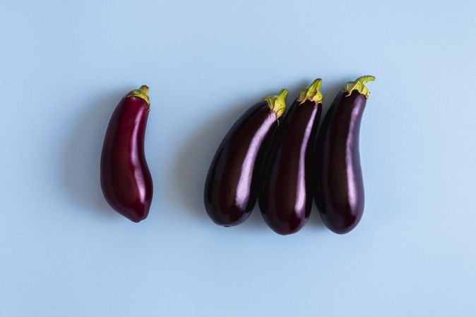Fresh organic eggplants top view