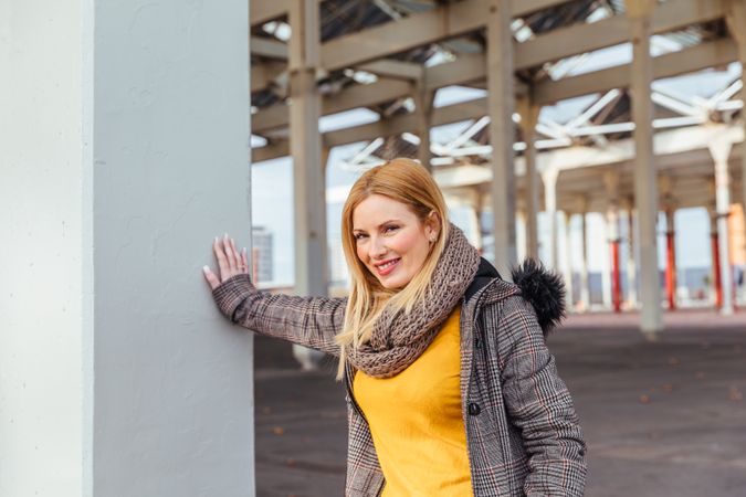 Portrait of blonde woman posing in the city