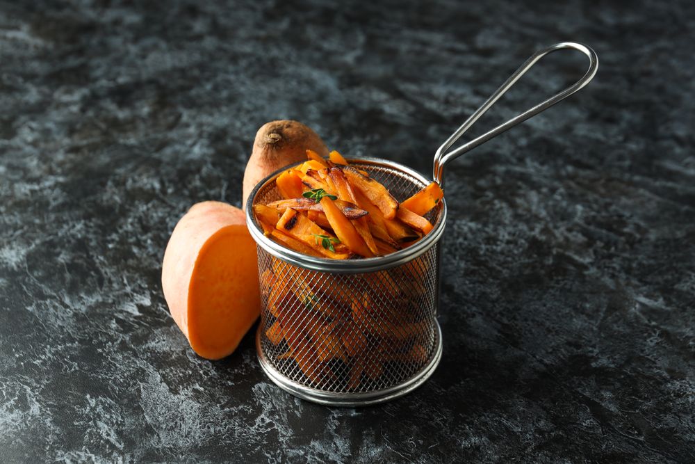 Concept of tasty food - sweet potato fries
