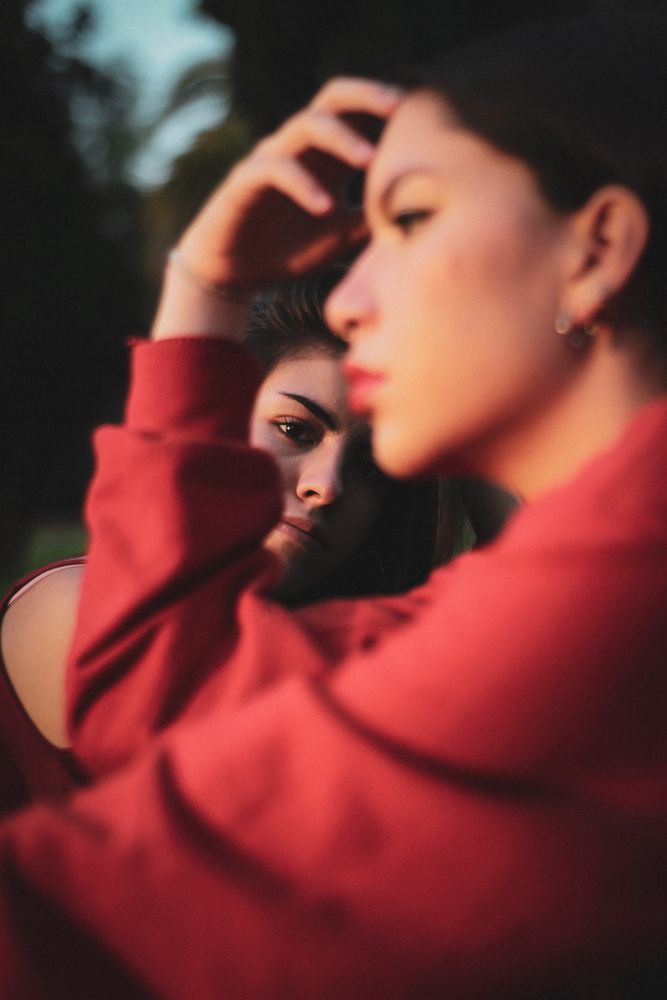 Selective focus photo of two women outdoor