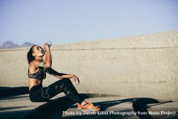 Fitness woman taking a break after workout 5qYdw5