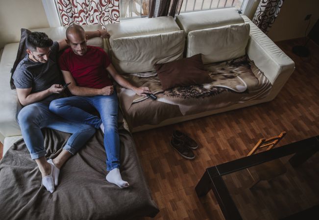 young gay couple at home