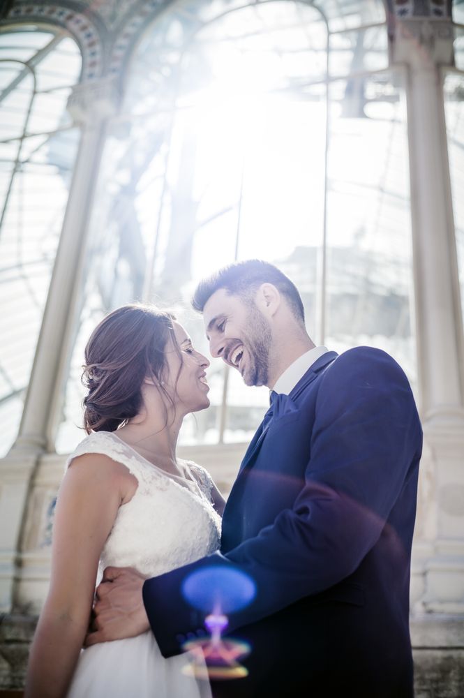 Newly weds having fun near vintage building