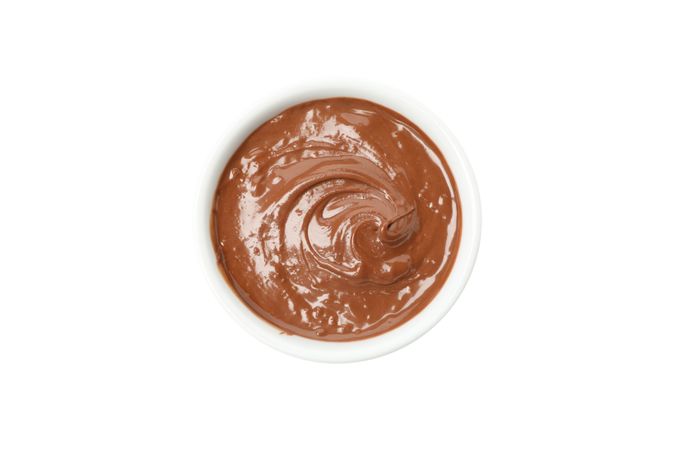 Bowl with melted chocolate isolated on blank background