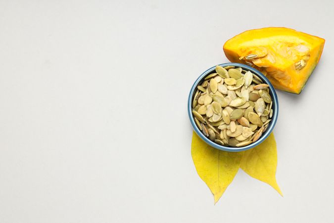Cooking ingredients for fall season - pumpkin seeds, pumpkin