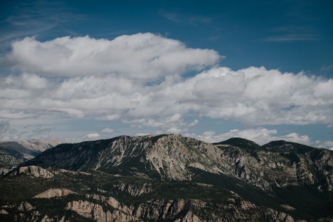 Landscape of majestic mountains under clouds