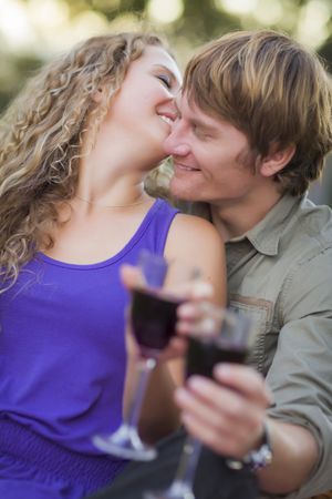 A Couple Enjoying A Glass Of Wine in the Park