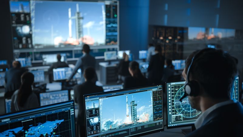 Space Agency Control Room Monitors Rocket Launch.