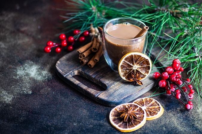 Cup of coffee or tea with fragrant Christmas spices