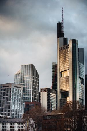 Cityscape of Frankfurt, Germany under cloudy sky