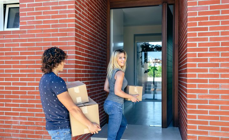 Couple moving into their new home