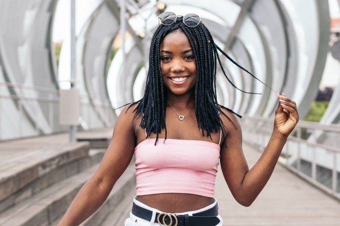 Portrait of a Black young woman enjoying the summer in the city
