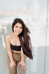 female model standing near wall