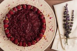 Fruit berry pie and branch of lavender on table