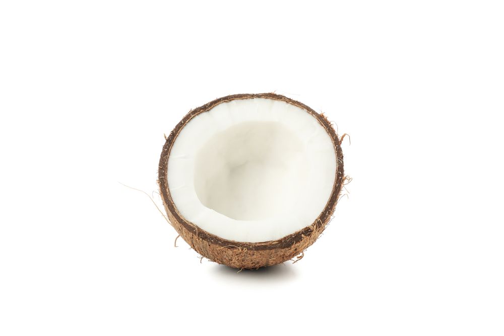 Coconut isolated on light background. Tropical fruit
