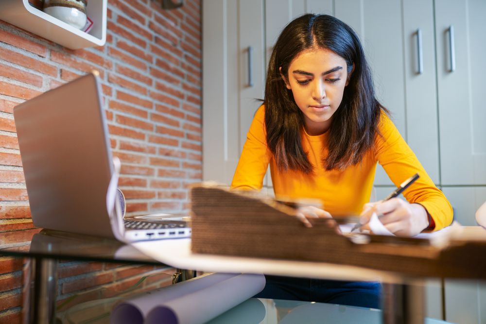 Persian woman architect designing a project