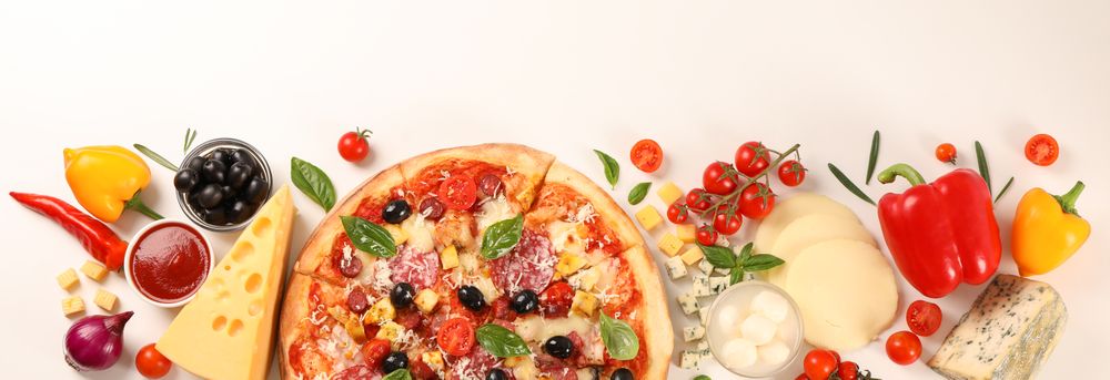 Flat lay. Pizza and ingredients: vegetables, cheese on plain background, copy space
