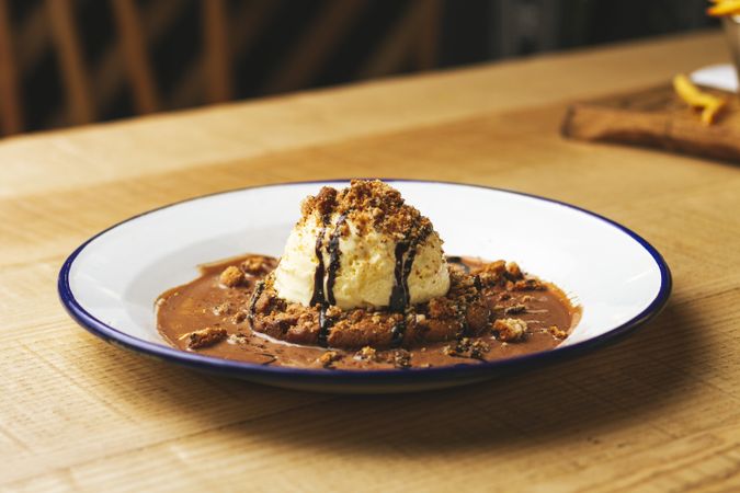 Tasty sweet burger with chocolate crumb and nuts