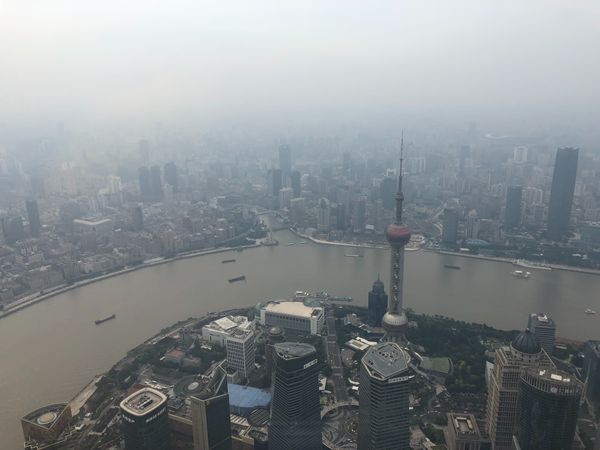 Aerial view of Lujiazui under foggy sky in Pudong, Shanghai, China