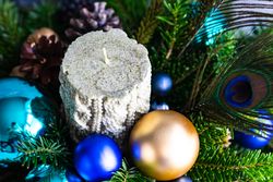Christmas festive centerpiece with candle in pine