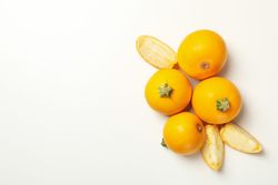 Round zucchini and slices on blank background, top view