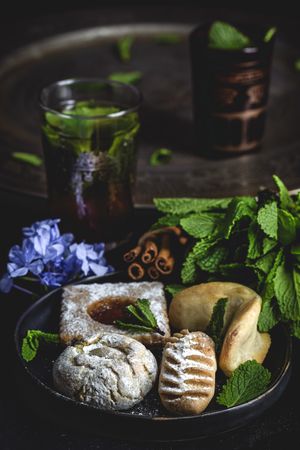 Traditional tea with mint and assorted Arab sweets