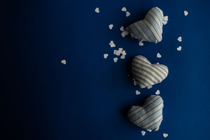 Blue Valentine day concept with felt heart decoration and confetti