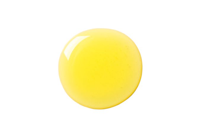 Drop of sweet honey isolated on neutral background