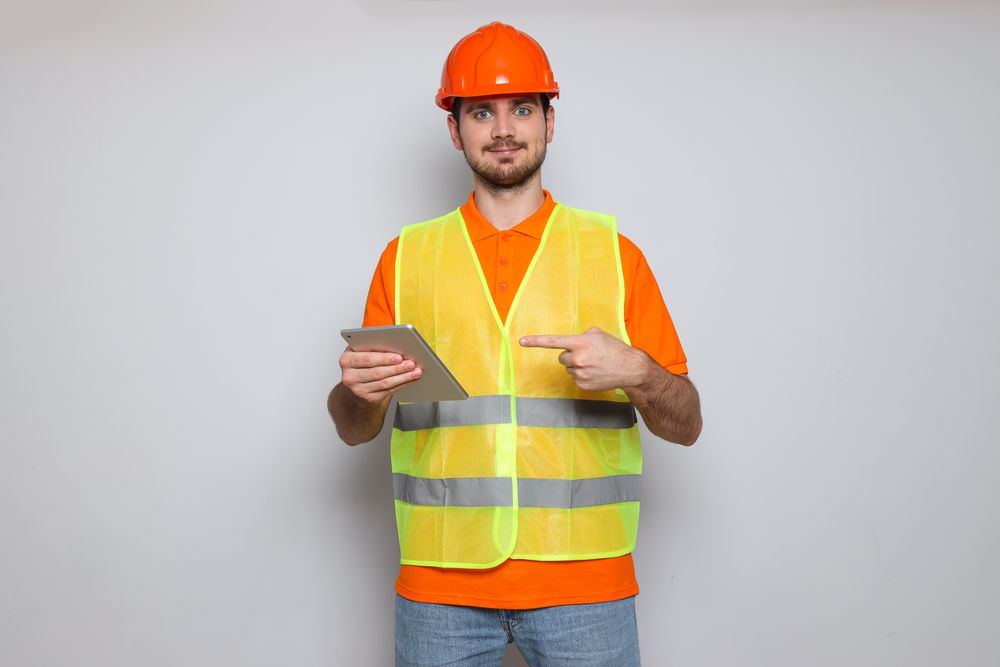 Young man civil engineer in safety hat