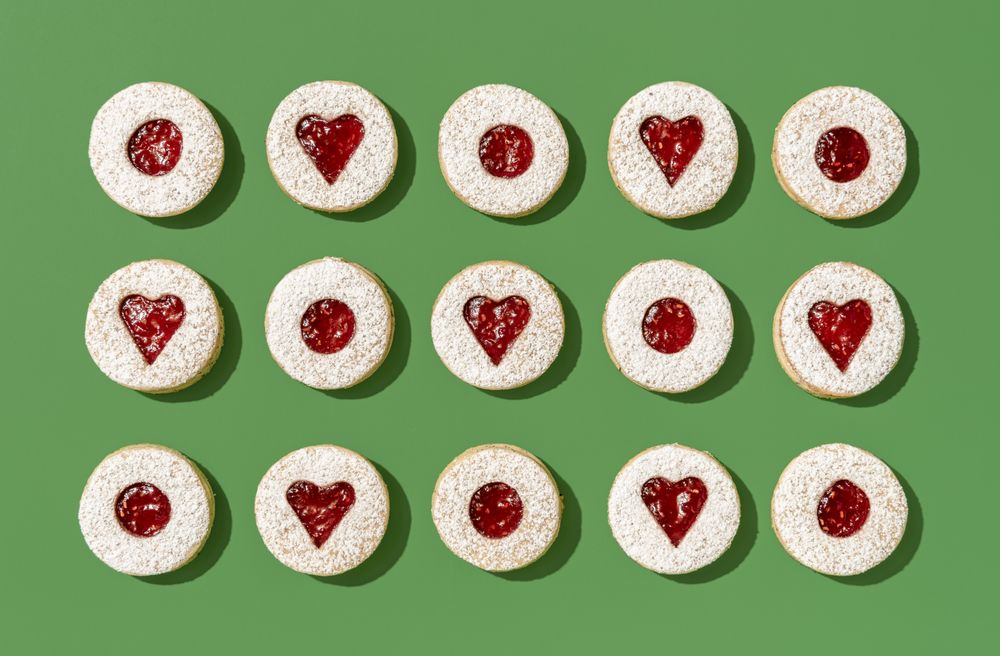 Christmas cookies on a green table, directly above view