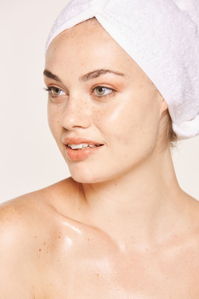 female with radiant body after cosmetic procedure
