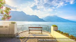 Bench on lakefront in Como Lake landscape, Bellagio Italy 4MZBEb