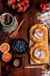 Breakfast food and drink on wooden table