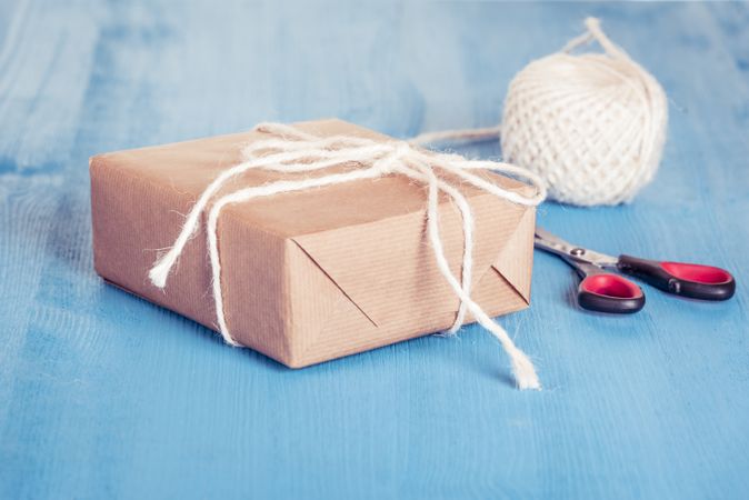 Gift wrapped in plain brown paper with natural twine
