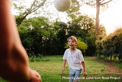 Cute little boy playing football with his father 4O3Mg4
