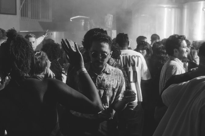 London, England, United Kingdom - Nov 9, 2022: B&W shot of people dancing at Dialled In Fest
