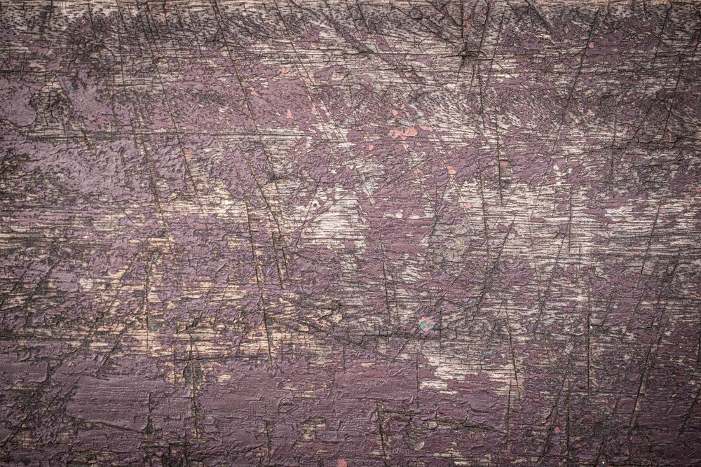 Close up grunge red paint wood plank texture background